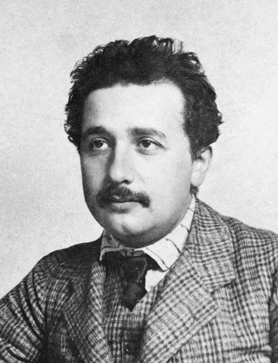 Albert Einstein at his desk in the Swiss patent office in Bern